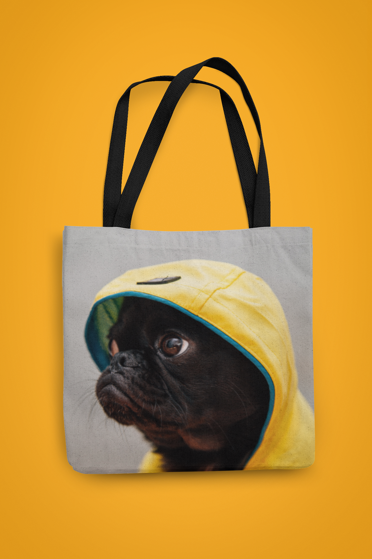 Pug in Yellow Hoodie Tote Bag